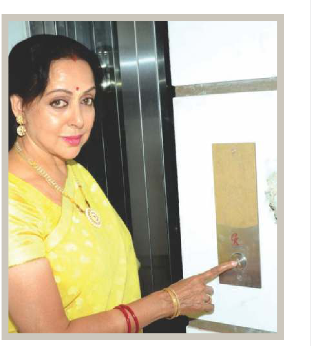 Hema Malini ji using the GK Elevators control panel at her residence in Mathura